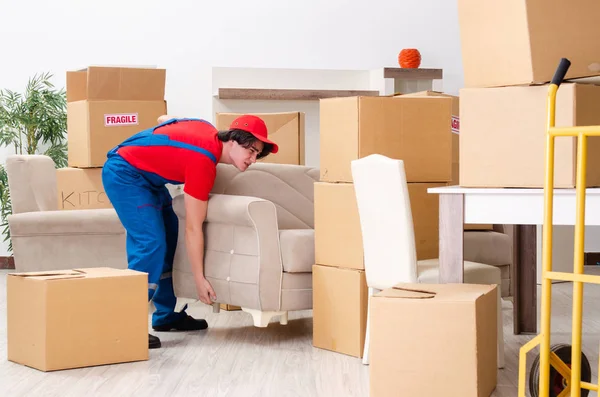 stock-photo-young-male-contractor-with-boxes